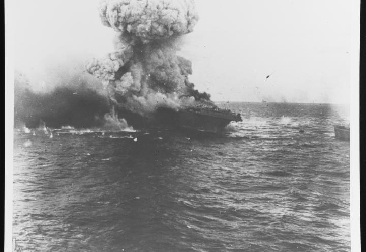 Smoke erupts from the ship, making it almost impossible to see the ship itself. 