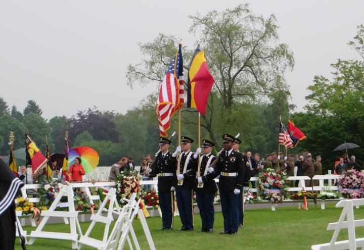 A U.S. Color Guard stands at attention during the ceremony.