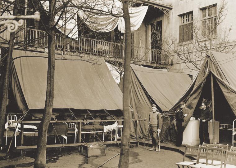 Tents used to house contagious soldiers during flu epidemic, Naval Base Hospital No. 5, Brest, December 1918.