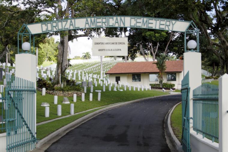 The entrance gate to Corozal American Cemetery.