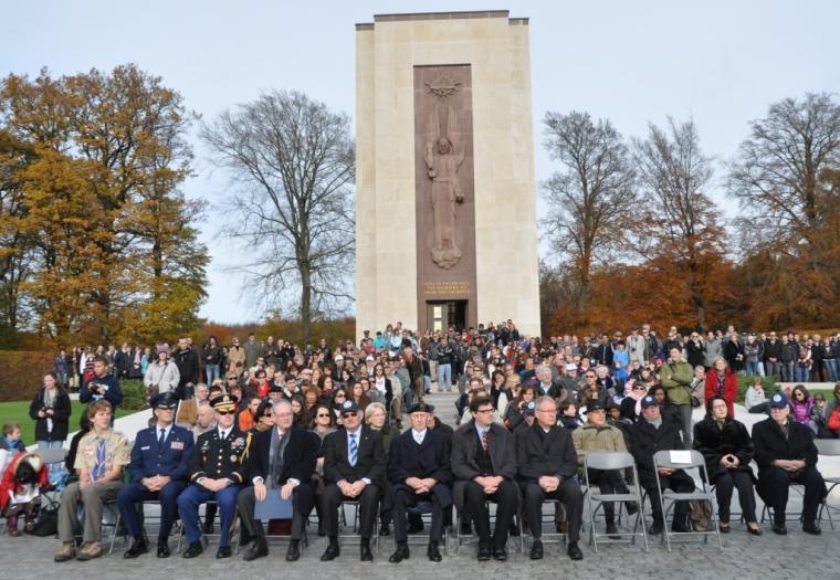 Attendees sit in chairs in front of the chapel at Luxembourg American Cemetery for the 2012 Veterans Day ceremony.