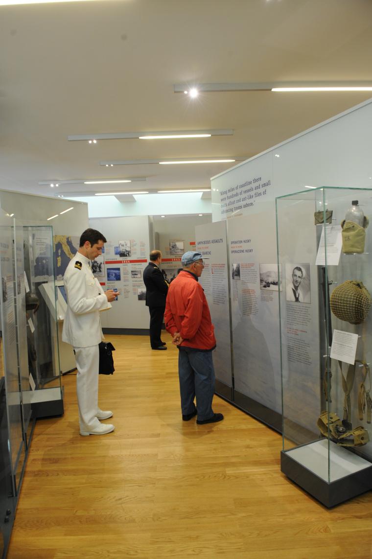 Visitors look at exhibits in the visitor center. 