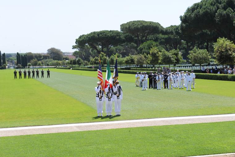 A color guard stands at attention during the ceremony. 