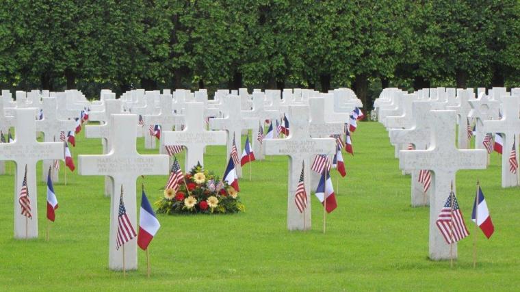 An American and French flag are in front of every headstone.