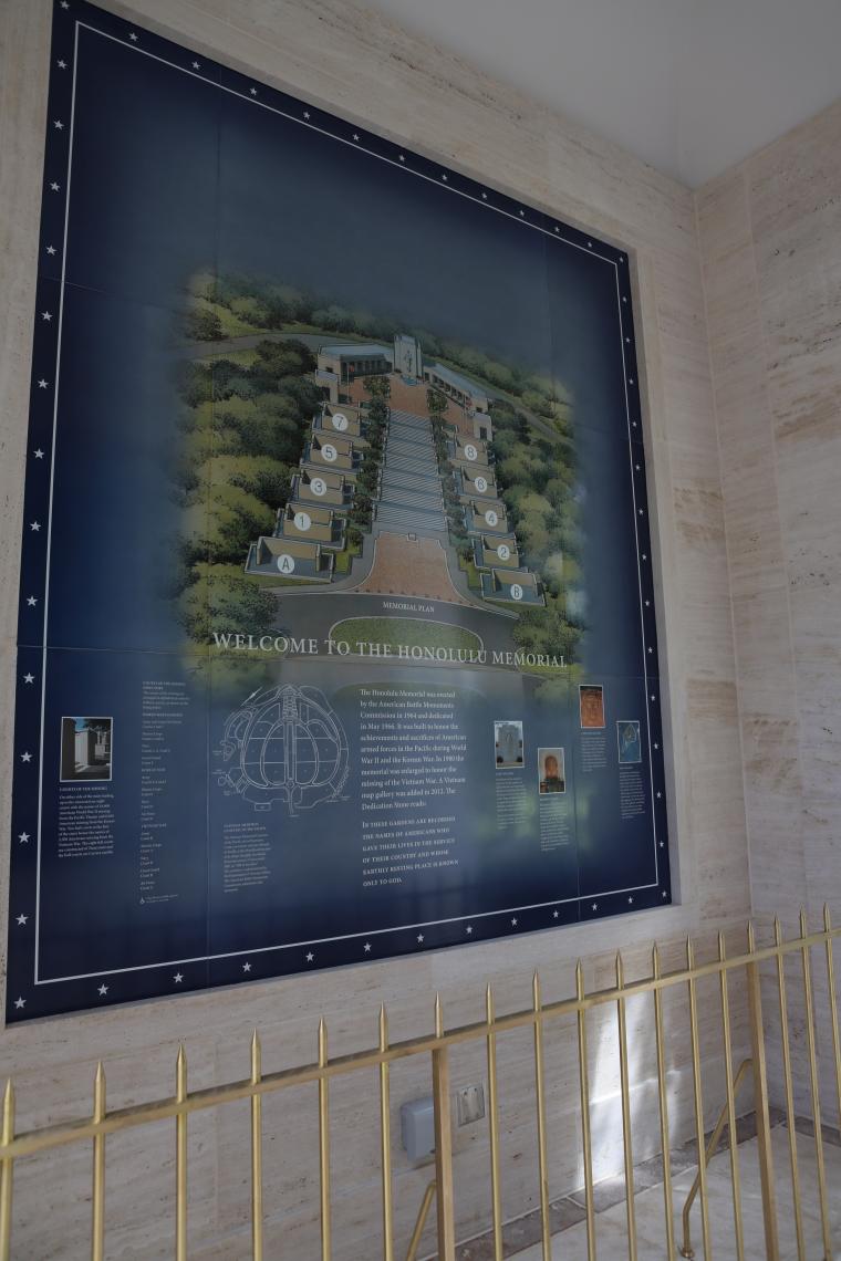 A porcelain orientation map is in a pavilion at the Honolulu Memorial. 