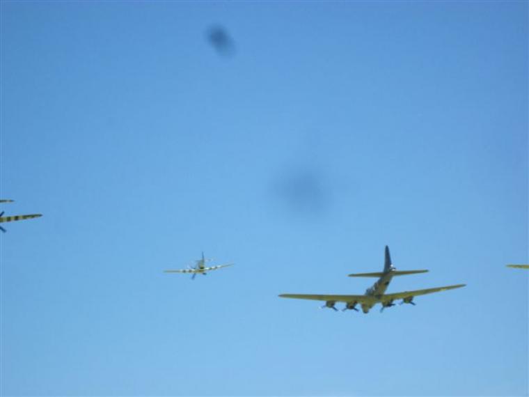 Two planes fly in blue sky. 