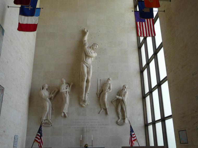 Sculptures above the altar in the chapel at Lorraine American Cemetery.