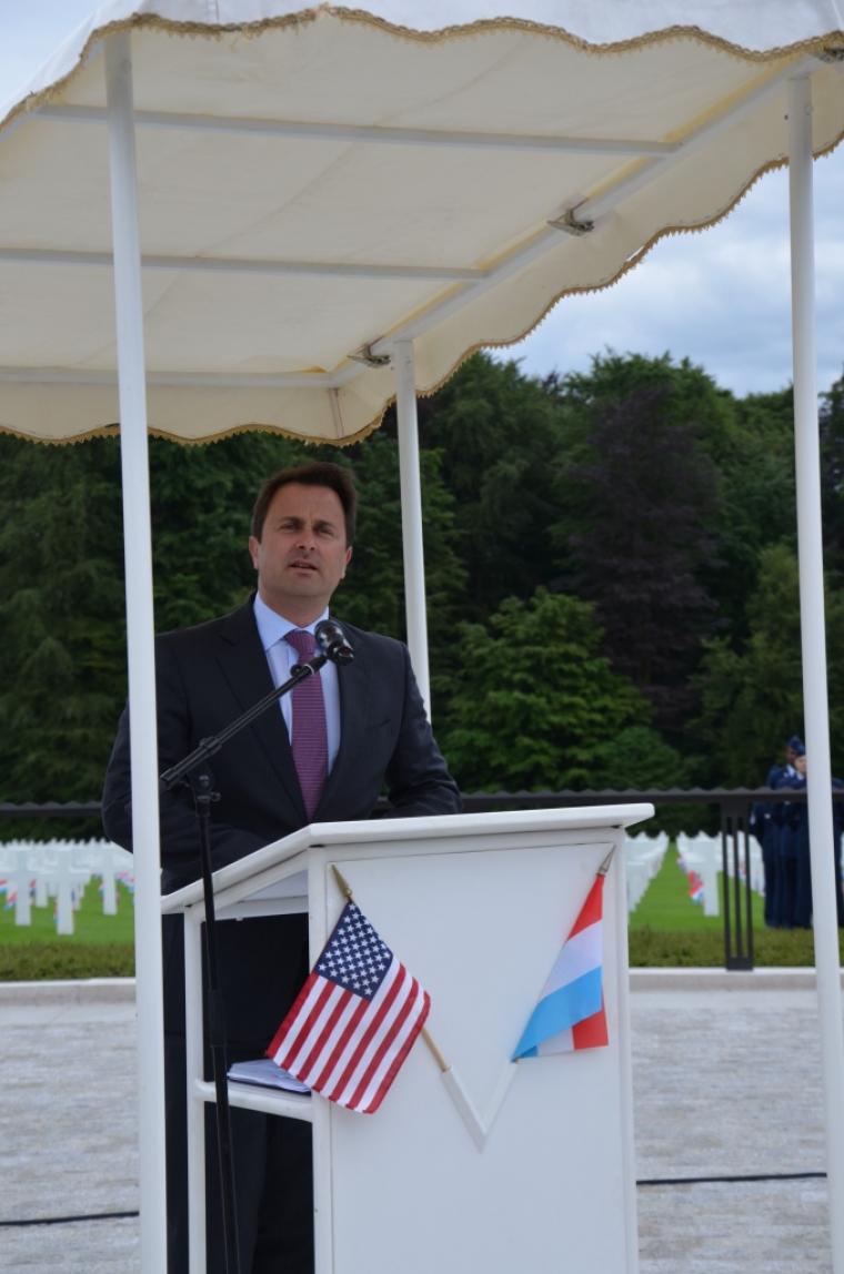 Xavier Bettel delivers remarks from the podium. 