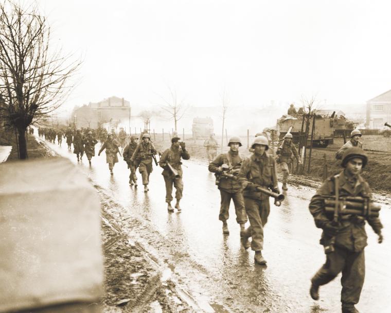 101st Airborne Division soldiers leave Bastogne in January 1945.