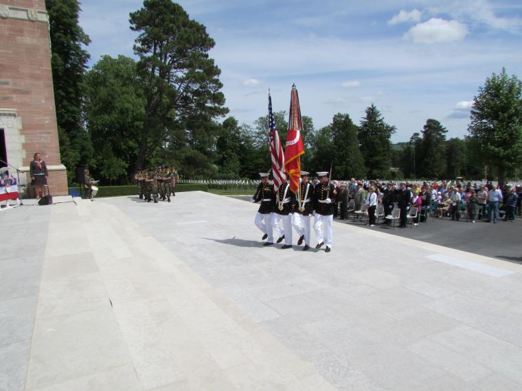 A U.S. Color Guard marches up the steps. 