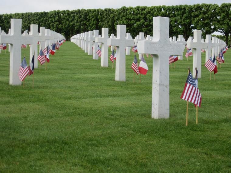 American and French flags are located at the base of every headstone. 