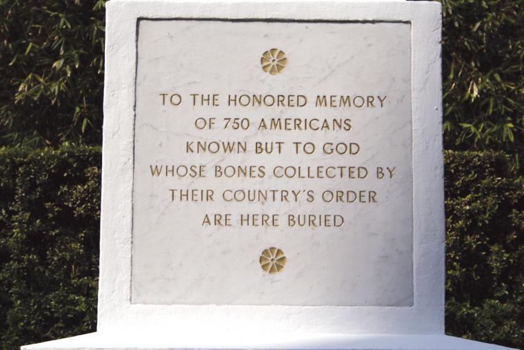 Inscription at Mexico City National Cemetery reads: "To the honored memory of 750 Americans known but to God whose bones collected by their country's order are here buried."
