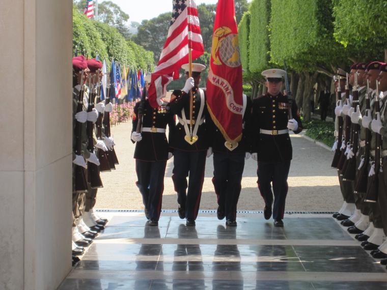 Members of the military participate in the 2012 Memorial Day ceremony at North Africa American Cemetery.