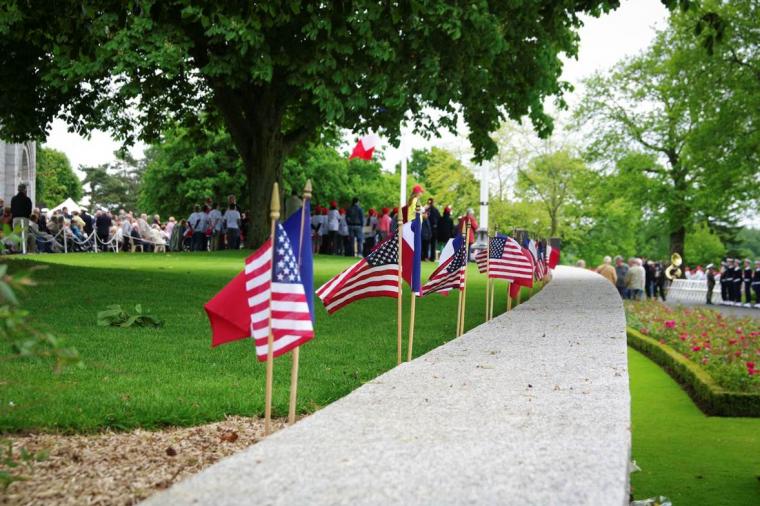 American and French flags line the Wall of the Missing. 