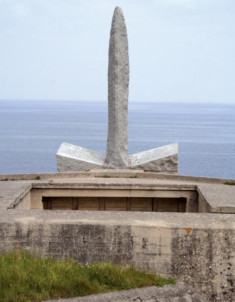 The Ranger Monument stands in front of the English Channel at Pointe du Hoc.