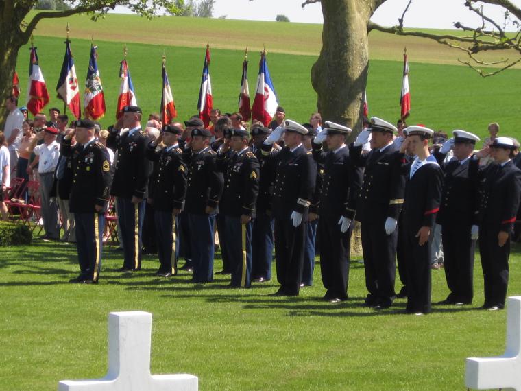 Members of the military participate in the 2012 Memorial Day ceremony at Somme American Cemetery.
