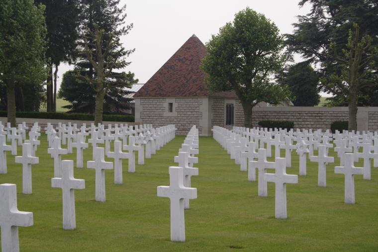 Rows of white headstones fill the plot area at Somme American Cemetery.