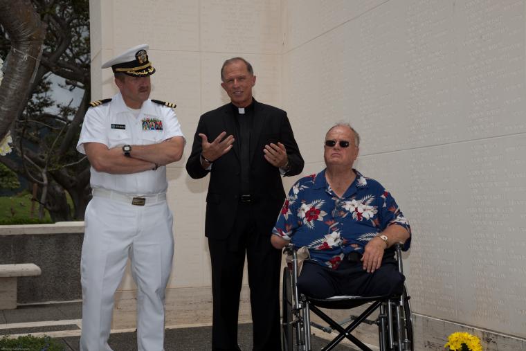 Command Chaplain John Brzek, Father Gary L. Secor, and ABMC Secretary Max Cleland at Honolulu Memorial 