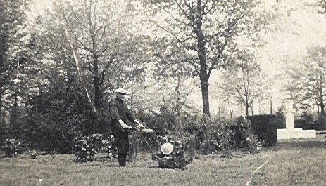 Achile Adams mowing the grass at Flanders Field American Cemetery. Credits: Flanders Field American Cemetery Archives