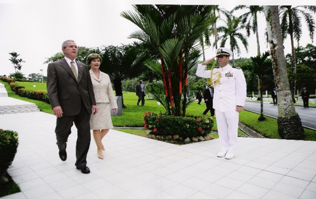 Picture of President George W. Bush and his wife visiting Corozal American Cemetery. Credits: American Battle Monuments Commission