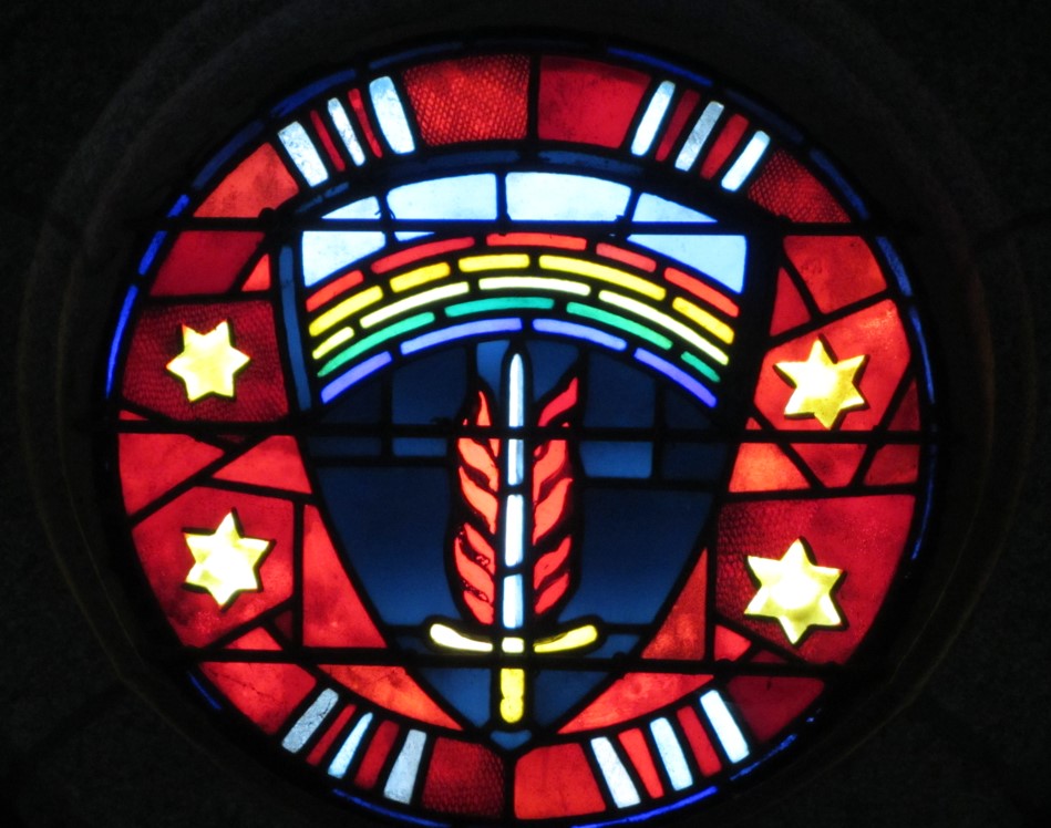 Stained-glass representing the Supreme Headquarters Allied Expeditionary patch. Credits: American Battle Monuments Commission