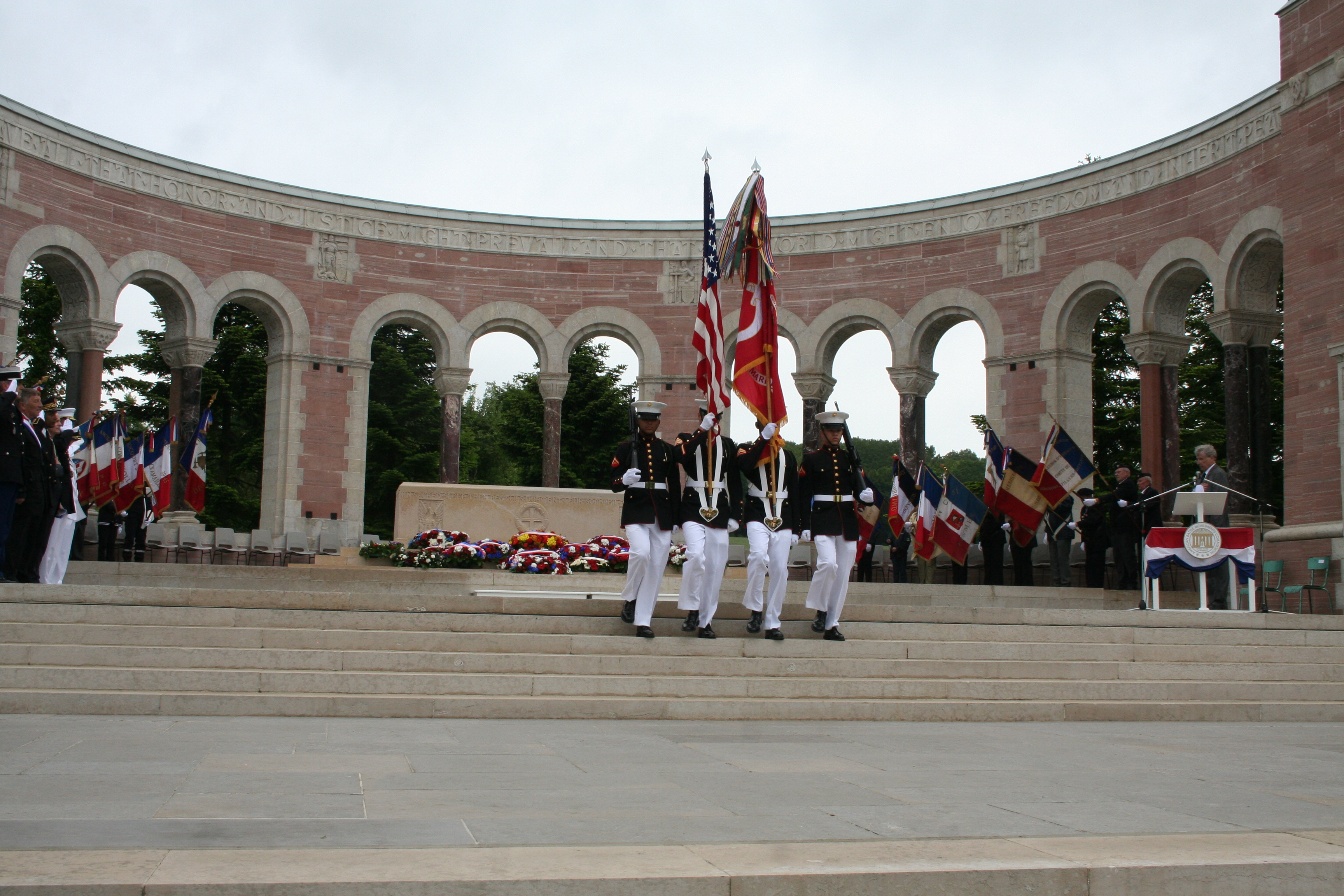 A Marine Color Guard retires the colors during the ceremony. 