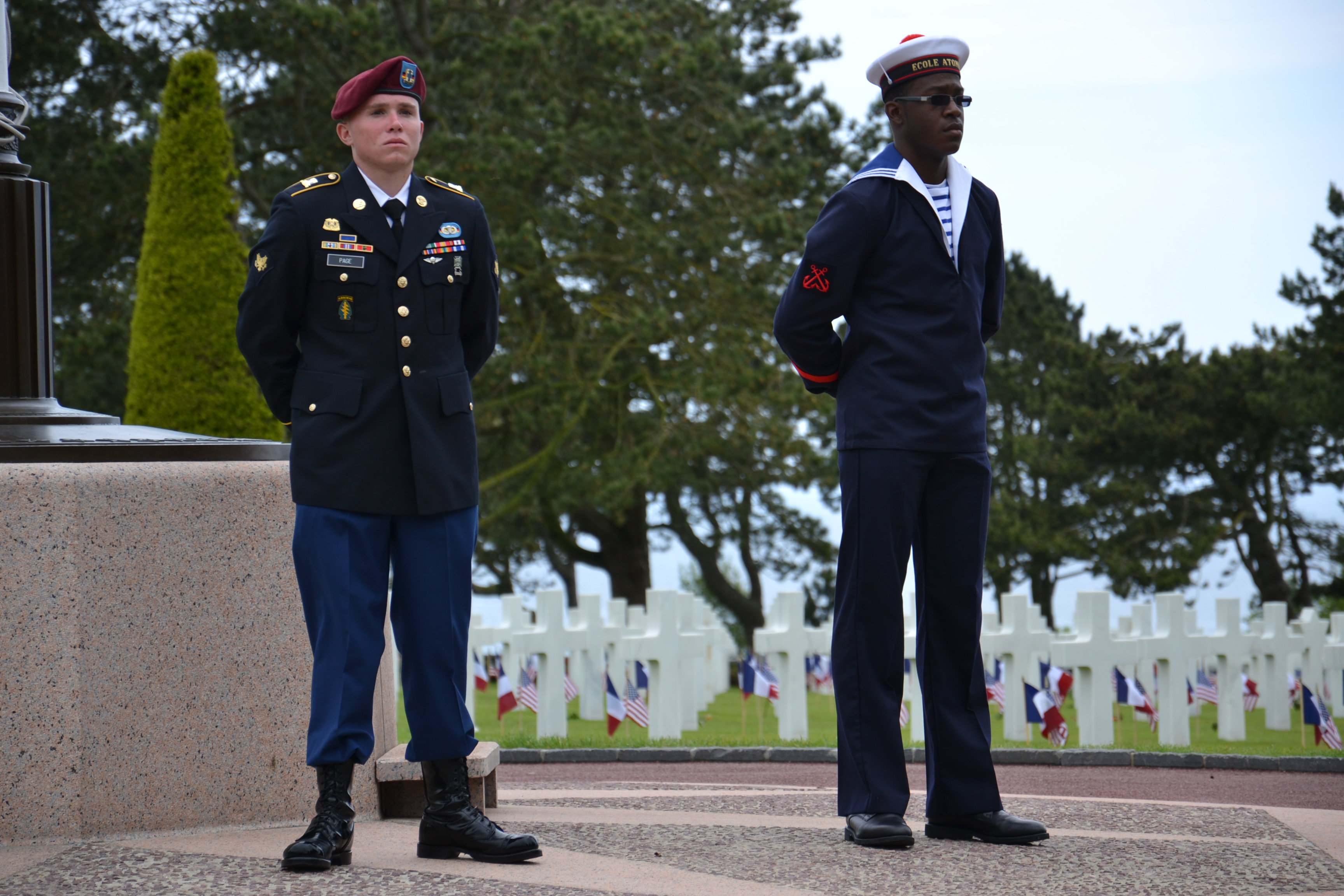 Members of the military participate in the 2012 Memorial Day ceremony at Normandy American Cemetery.