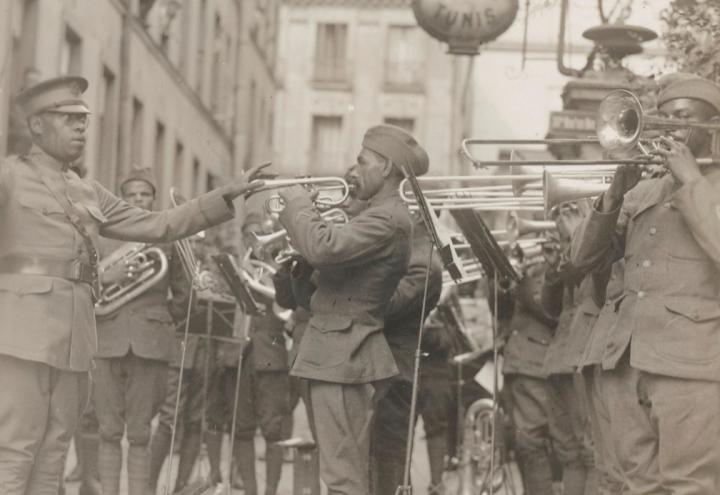 @NARA. 1st Lt. James Reese Europe of the 369th Regt. Inf. playing for the patients of American Red Cross Hospital #9, Paris, France. September 1918. 