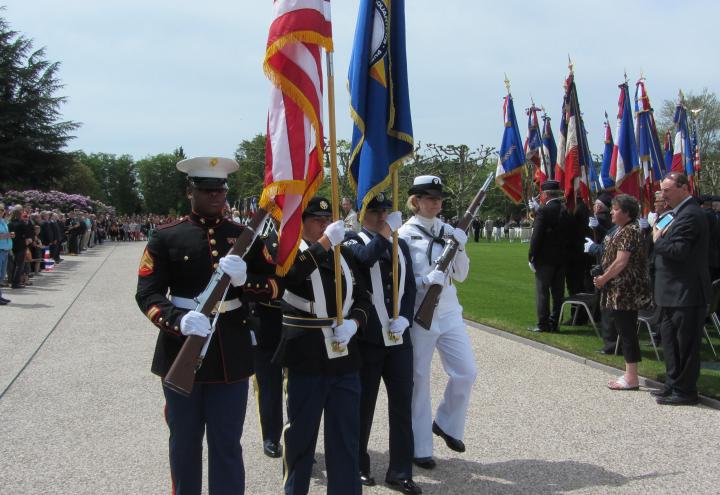 A U.S. Color Guard marches during the ceremony. 