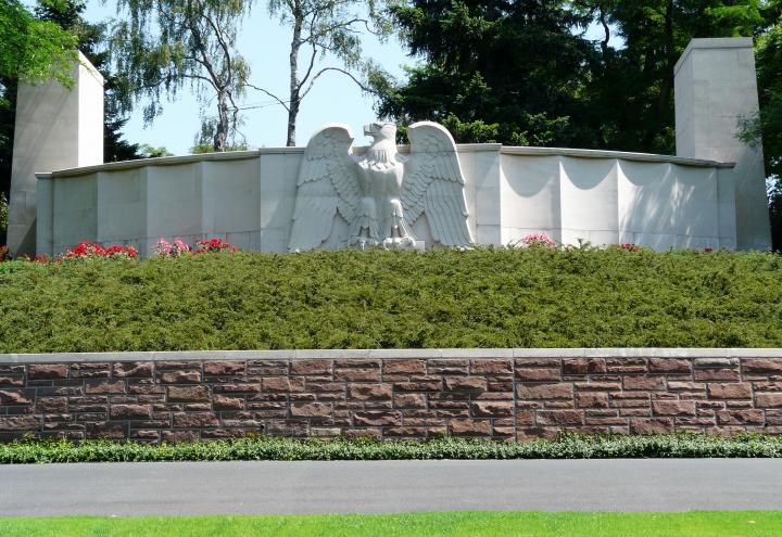 An eagle sculpture adorns the entrance to Lorraine American Cemetery.