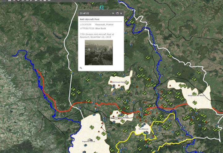 A map shows forests, rivers, farms, battle lines, and photo references. 
