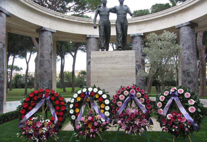 Floral wreaths were laid in front of the Brothers in Arms statue. 