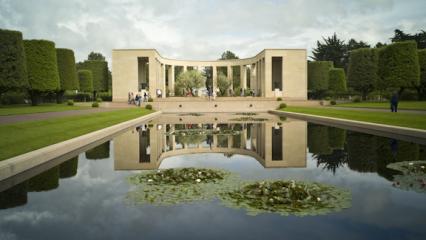 The memorial area at Normandy American Cemetery is shown in the reflecting pool.