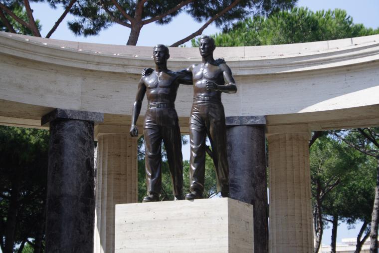 Bronze statue of two brothers in arms is located at Sicily-Rome American Cemetery.