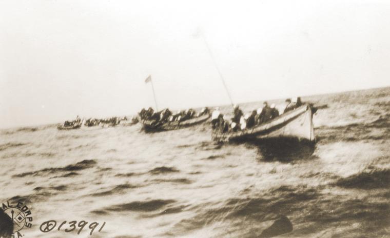 Survivors of the USS President Lincoln drift in lifeboats after a German submarine sank her.