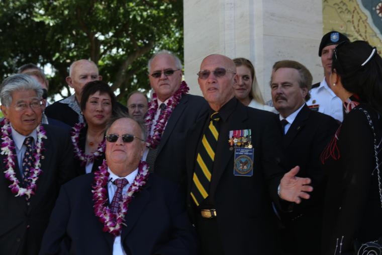 Senator Daniel Akaka, Congresswoman Colleen Hanabusa, ABMC Secretary Max Cleland, and National Cemetery of the Pacific Superintendent Gene Castagnetti stand in front of the new pavilions after the dedication. 