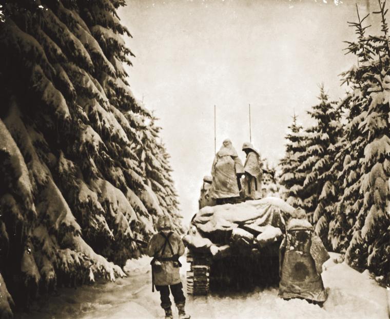 82nd Airborne Division soldiers advance in Battle of the Bulge.