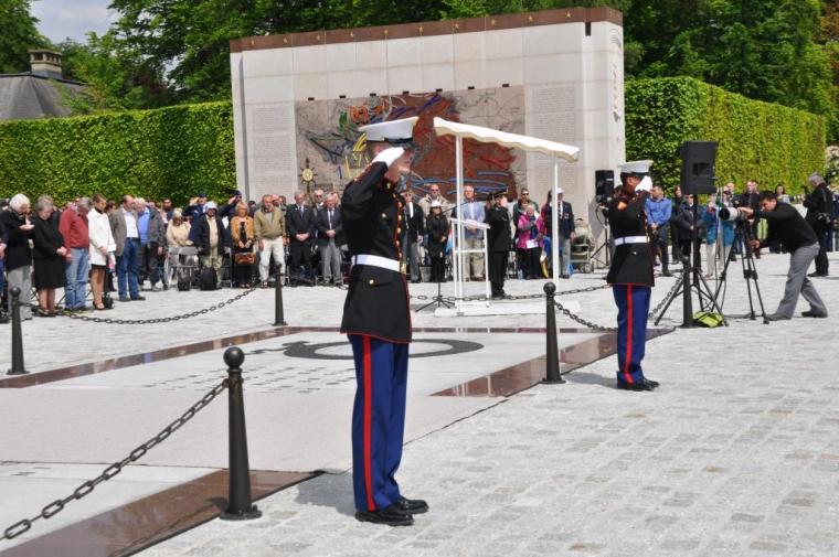 Marines salute during the Memorial Day ceremony.