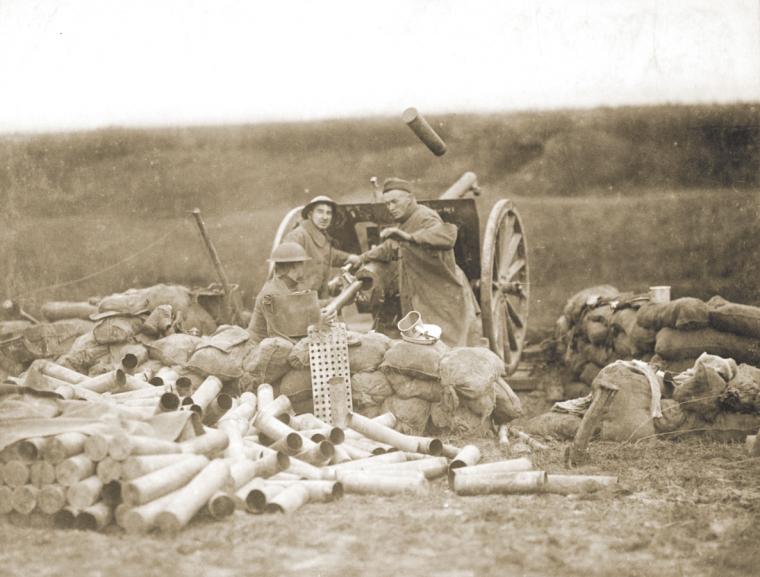 U.S. artillerymen fire 75mm gun toward Montsec from a position near Beaumont on September 12, 1918.