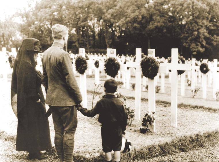 Three Americans pay their respects at Suresnes American Cemetery in 1919.