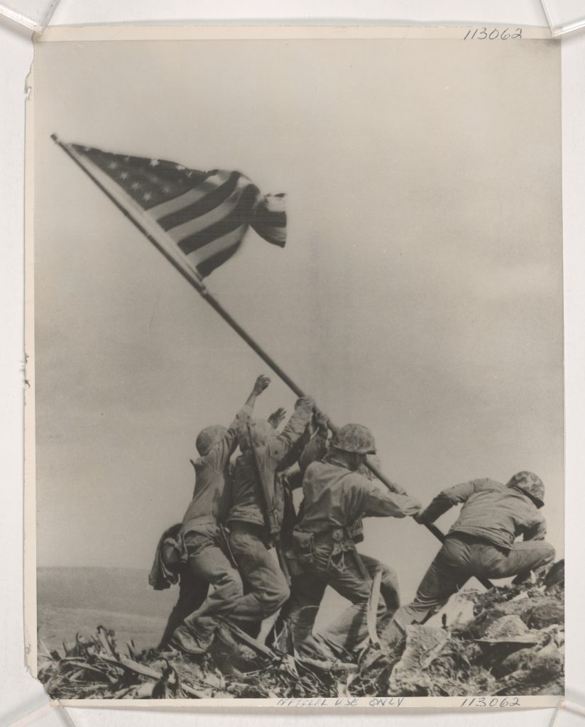 The iconic image taken by Associated Press photographer Joe Rosenthal of U.S. Marines raising the U.S. flag on the top of Mount Suribachi Feb. 23, 1945. (National Archives)