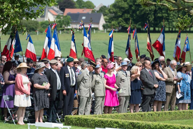 Attendees stood during the 2018 Memorial Day Ceremony at Somme American Cemetery. Photo credit: Chantal Mistral-Bernard/American Battle Monuments Commission.