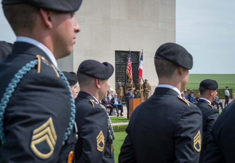 An American officer delivers remarks from the podium during the World War I Centennial Ceremony at Somme American Cemetery to Mark the 1st American Offensive. Photo credit: Chantal Mistral-Bernard/American Battle Monuments Commission.