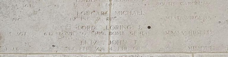 A rosette was placed by U.S. Army Air Forces Staff Sgt. Loring E. Lord at Henri-Chapelle American Cemetery signifying he has been accounted for.