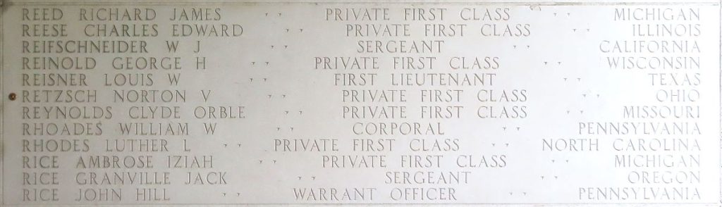 A rosette next to the name of Pfc. Norton V. Retzsch on the Walls of the Missing at Manila American Cemetery signifies he has been identified. (ABMC photo)