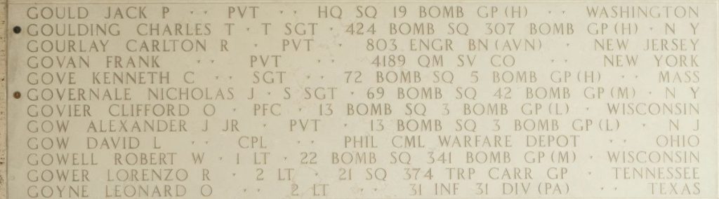 A bronze rosette next to the name of Staff Sgt. Nicholas J. Governale on the Walls of the Missing at Manila American Cemetery signifies he has been identified. (ABMC photo)