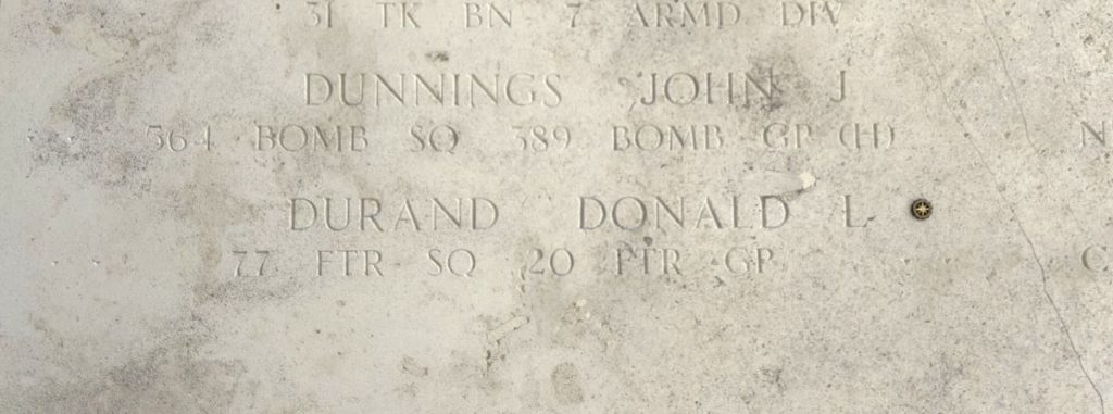 A rosette next to the name of 2nd Lt. Donald L. Durand on the Walls of the Missing at Henri-Chapelle American Cemetery signifies he has been identified. (ABMC photo)