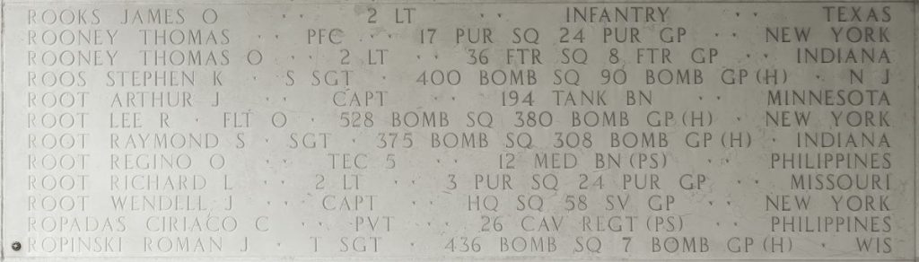 A rosette next to the name of Tech Sgt. Roman J. Ropinski on the Walls of the Missing at Manila American Cemetery signifies he has been identified. (ABMC photo)