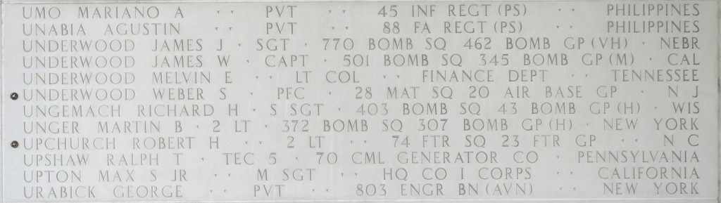 A bronze rosette next to the name of Pfc. Weber S. Underwood on the Walls of the Missing at Manila American Cemetery signifies he has been identified. (ABMC photo)
