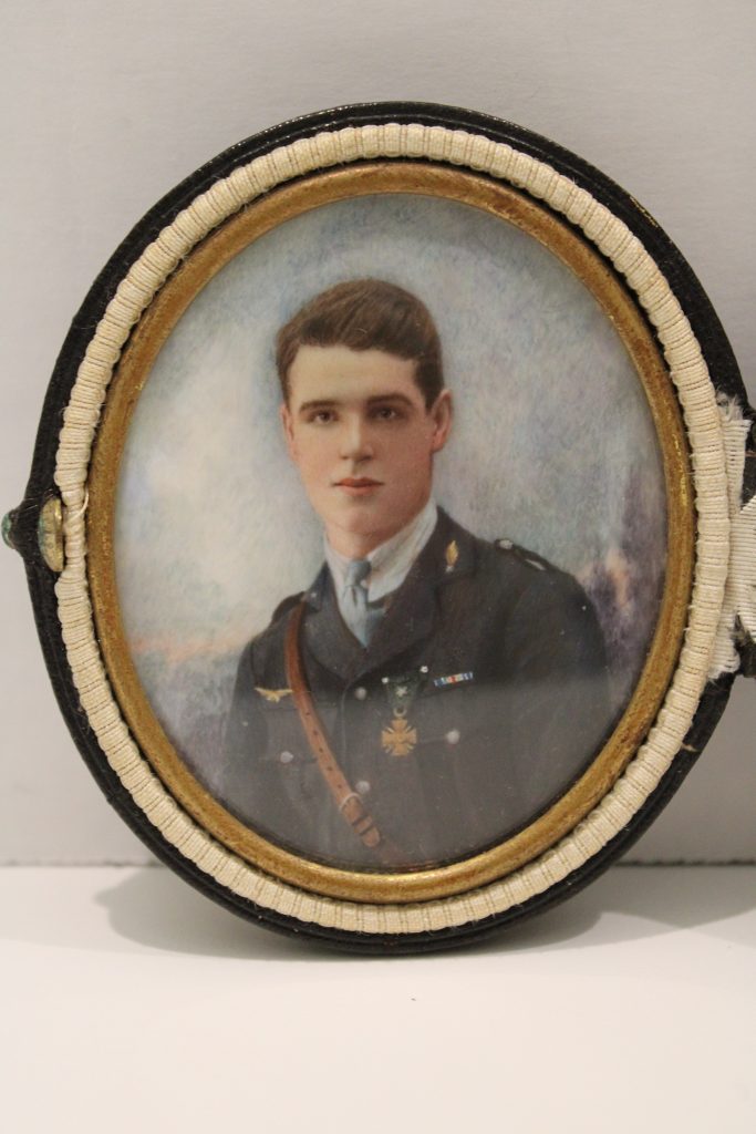 Oval-framed portrait of 2nd Lt. Meredith Dowd, in uniform, featuring medals and insignia on the jacket.